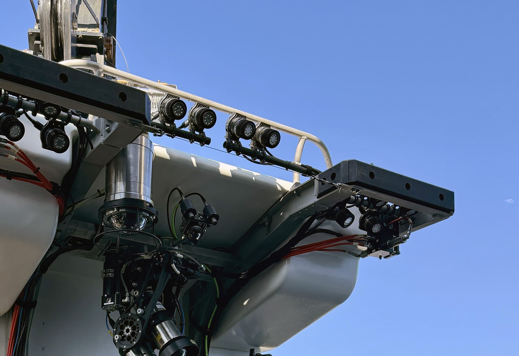 Camera, lighting, and manipulator array on an ROV Pod payload